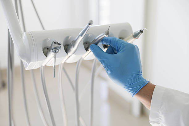 Professional Root Canal Treatment technician working in St. John, MO